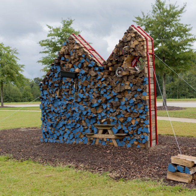 Heath Matysek-Snyder (Virginia, b. 1978), Komíny-NBS Explore, 2013, firewood, picnic table, desk, tricycle, paint, and steel pipe, ca. 108 x 144 x 48 inches