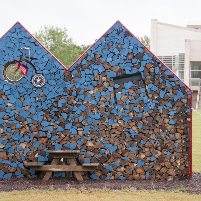 Heath Matysek-Snyder (Virginia, b. 1978), Komíny-NBS Explore, 2013, firewood, picnic table, desk, tricycle, paint, and steel pipe, ca. 108 x 144 x 48 inches