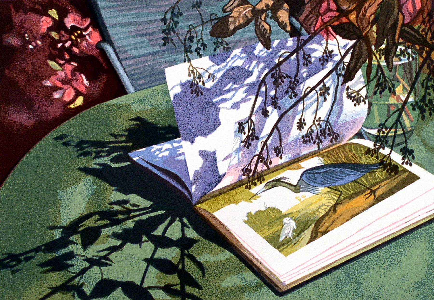 Warm light and shadows move across a book, opened to a picture of a heron.