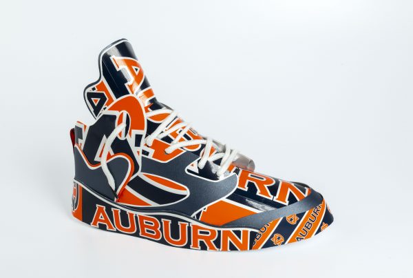 A Jordan Air5 sneaker made made of recycled materials from the Auburn Bookstore