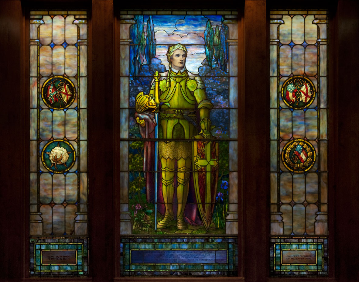A stained glass window of a knight.