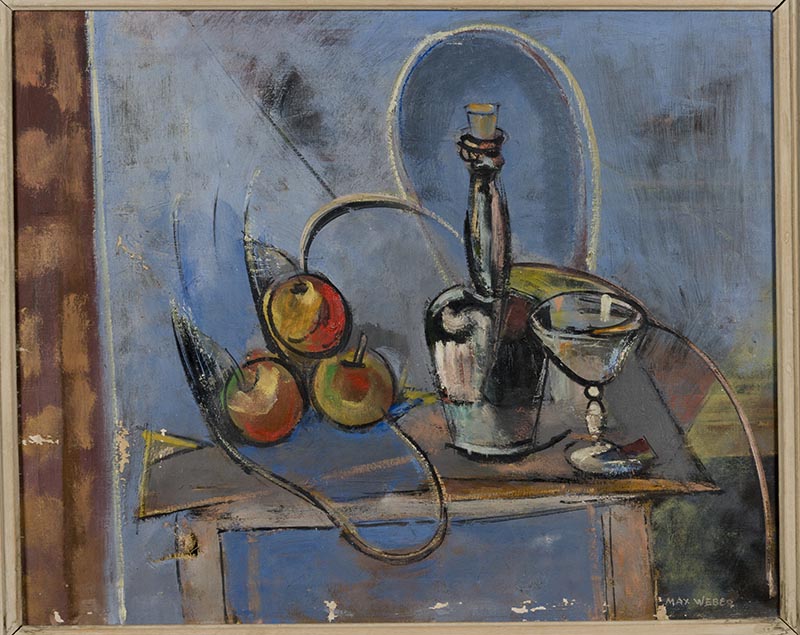 Stack of apples on a table next to a bottle and a goblet, against a blue background.