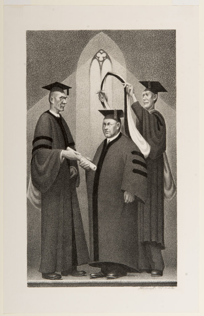 Image of three men in cap and gown, one is placing a sash on one man and the other is handing him a diploma