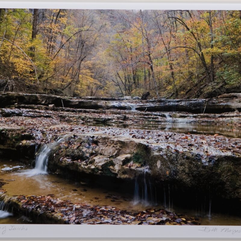 open river with small waterfalls